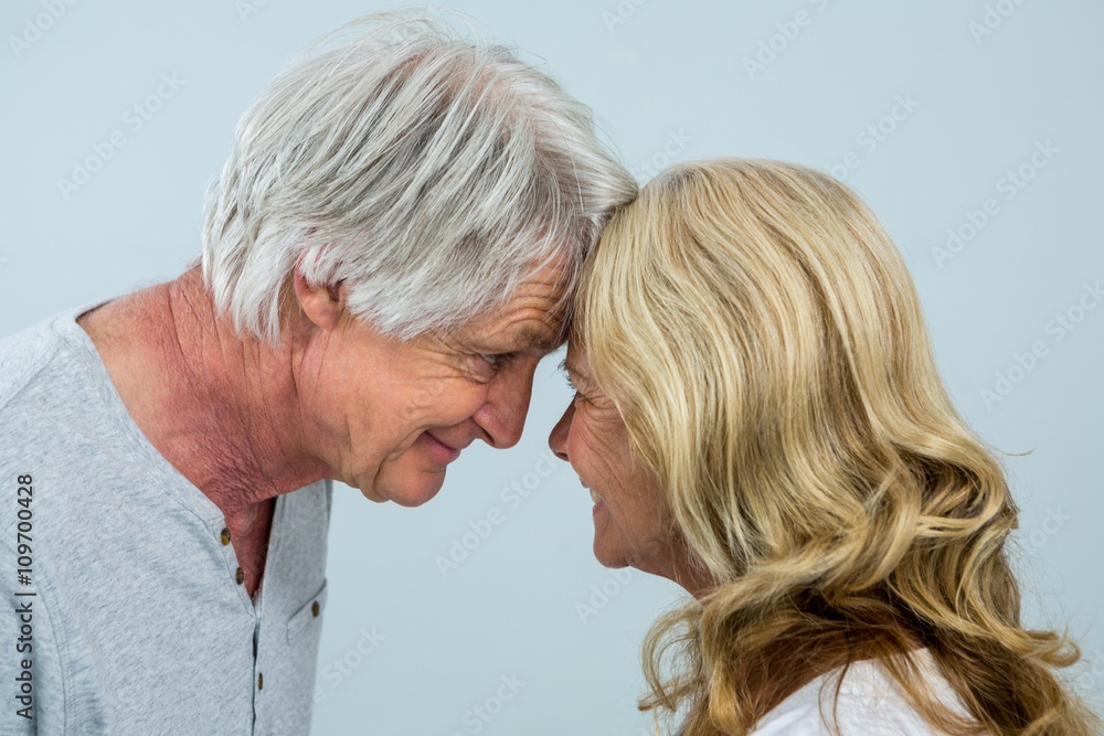 Close-up of romantic senior couple at home Close-up of romantic senior couple at home