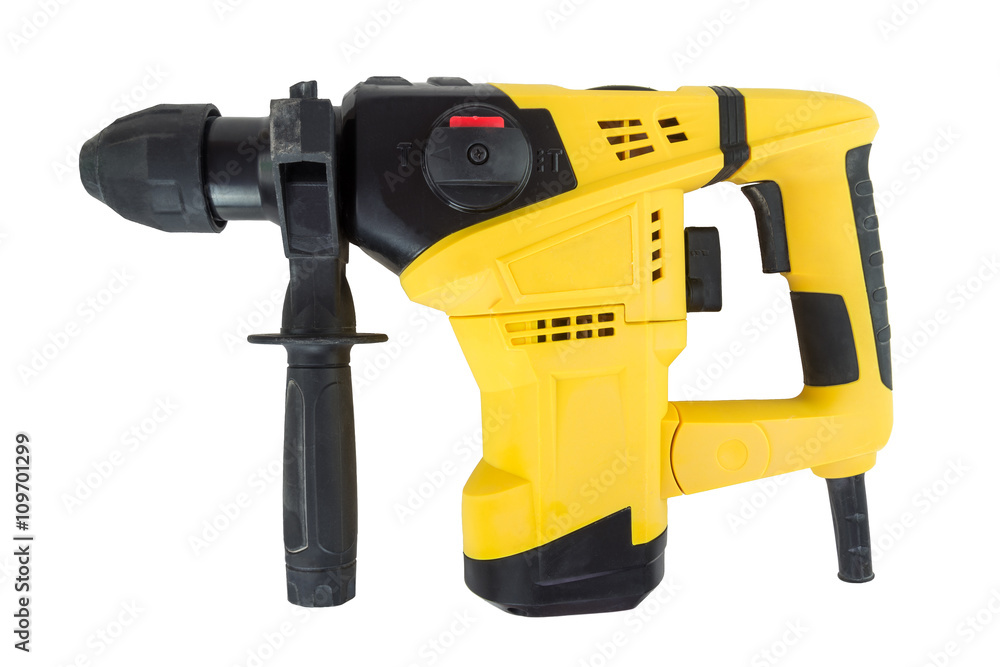 Yellow electrical impact hammer isolated on a white background. Yellow electrical impact hammer isolated on a white background.