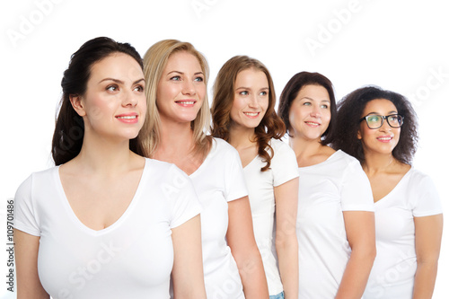 group of happy different women in white t-shirts
