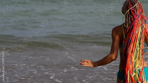 slender young girl on the coast