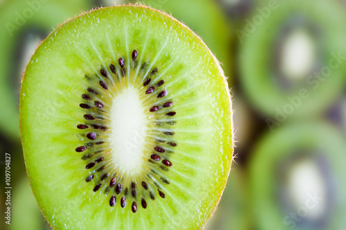 fresh kiwi fruit slice on kiwi background
