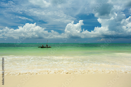Traditional Zanzibar fishing boat on a beautiful landscape with