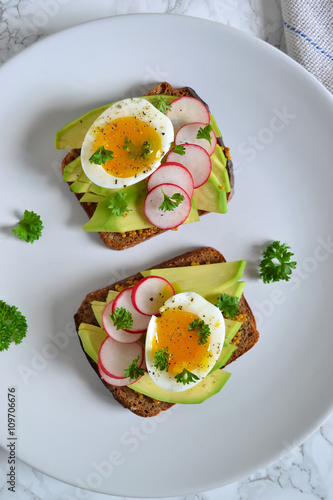 toast with avocado, radish and egg