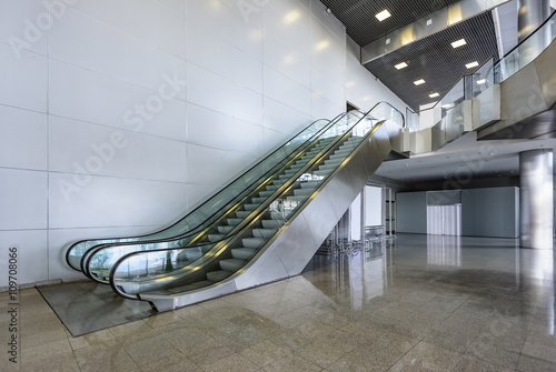 Escalator room with glass photo