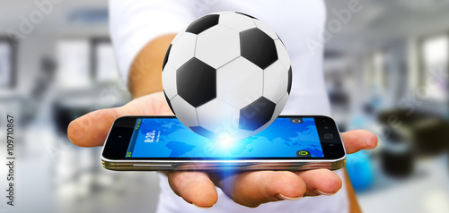 Fotografi Businessman holding football in his hand