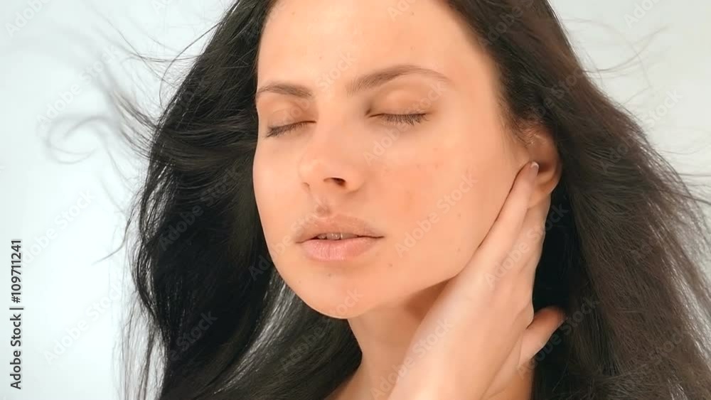 The girl with big eyes posing in the studio,slow motion