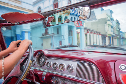 Havana, view from inside an old vintage classic american car, Cuba © Delphotostock