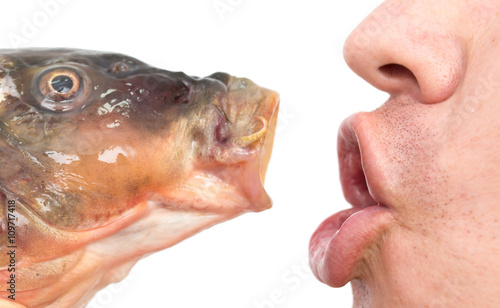 Photography kiss a fish on a white background