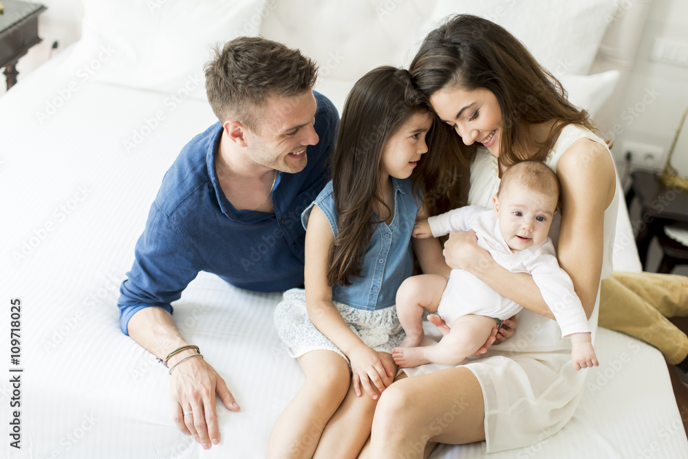 Family on the bed