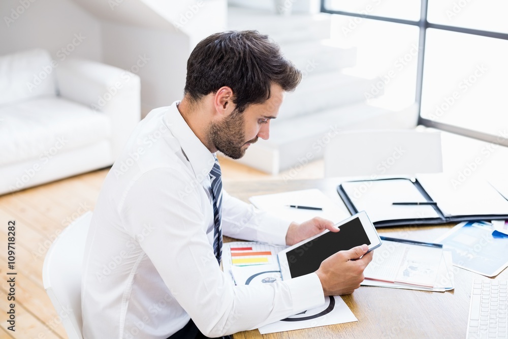 Businessman using digital tablet Businessman using digital tablet