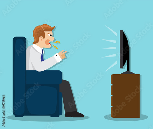aggressive man sitting in a chair, cursing and watching TV