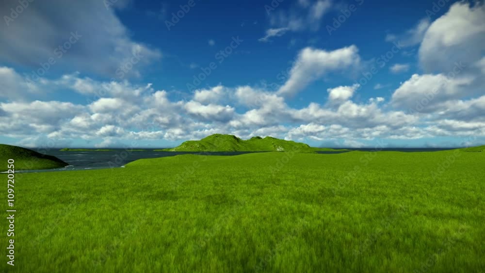Green meadow and ocean against beautiful timelapse clouds Green meadow and ocean against beautiful timelapse clouds