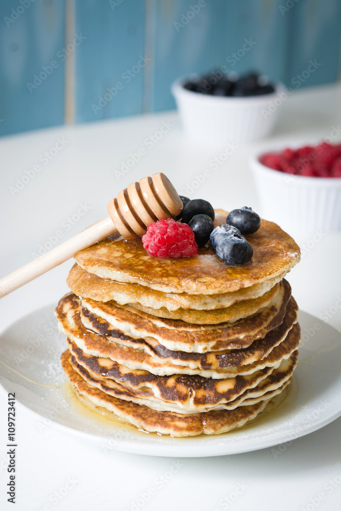 American pancakes with raspberries and blueberries
American pancakes with raspberries and blueberries