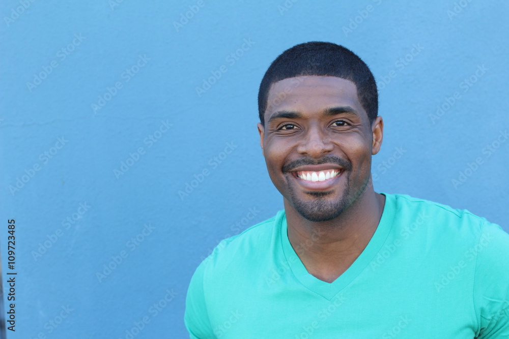 Close up portrait of a handsome young man smiling with copy space Close up portrait of a handsome young man smiling with copy space