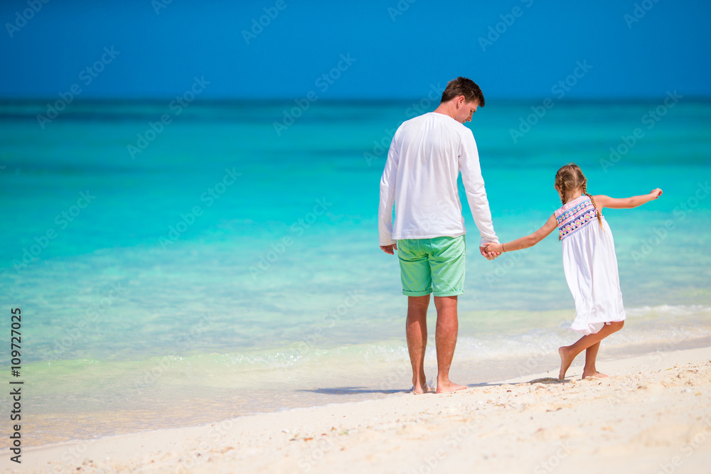 Happy family having fun on white tropical beach Happy family having fun on white tropical beach
