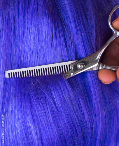 Hairdressing Scissors in hand at the hairdresser.