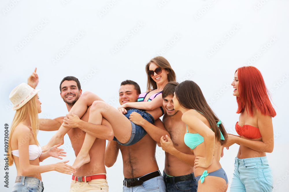 Beautiful young people having fun on beach Beautiful young people having fun on beach