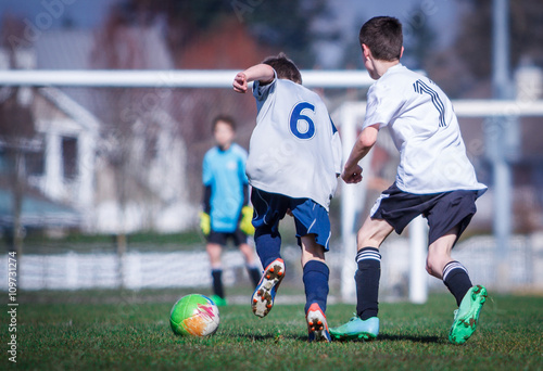 Boys playing soccer
