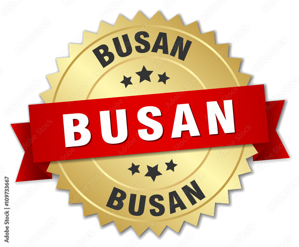 Busan round golden badge with red ribbon Busan round golden badge with red ribbon