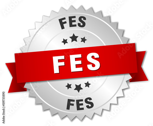 Fes  round silver badge with red ribbon