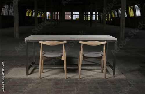Fototapeta Naklejka Na Ścianę i Meble -  modern wooden table in the loft interior 