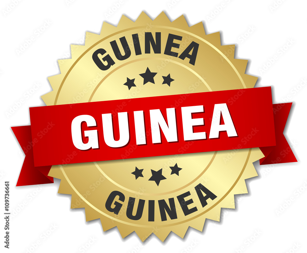 Guinea round golden badge with red ribbon Guinea round golden badge with red ribbon