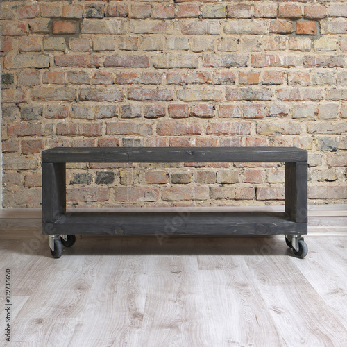 modern wooden tv unit in the loft interior 