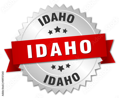 Idaho  round silver badge with red ribbon