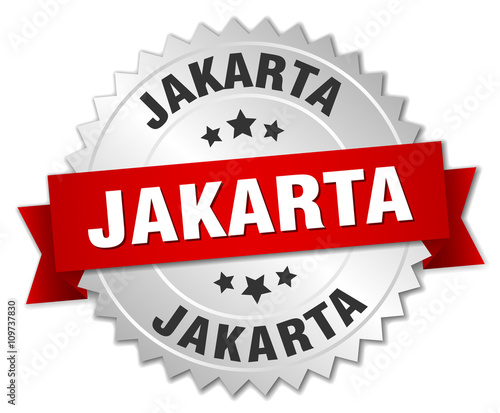 Jakarta round silver badge with red ribbon