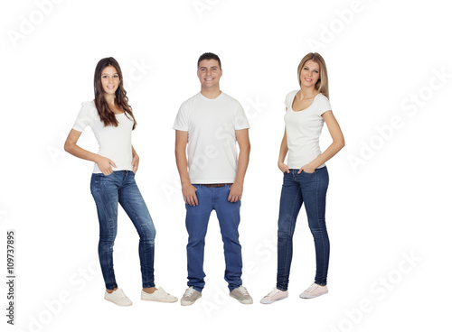 Three young friends with jeans and white t-shirt