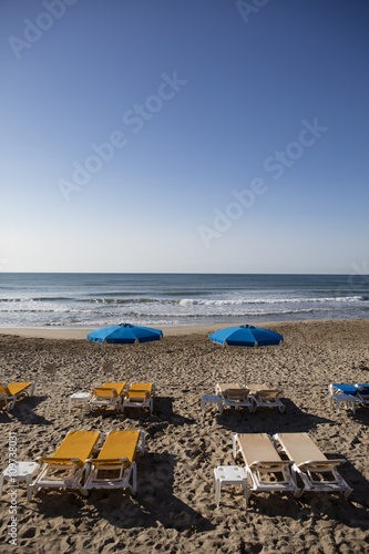 beach lies on the beach of Sitges, Spain, April 7, 2016