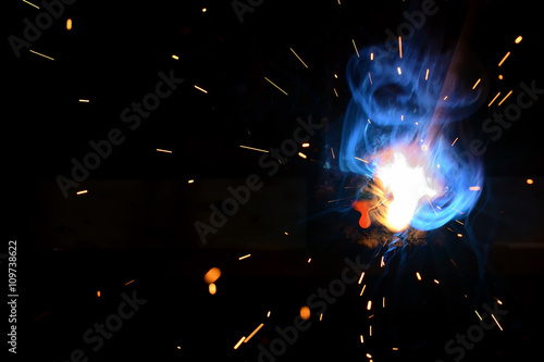 Drop of molten iron and sparks