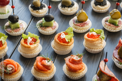 Fresh Assorted snacks of canape on the table