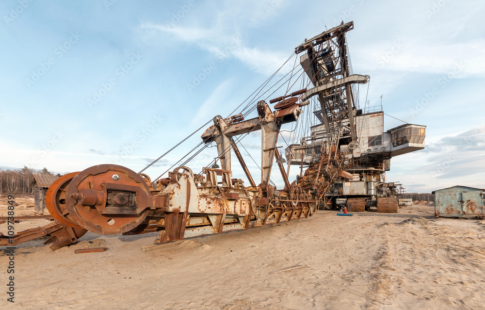 Many buckets of giant career excavator Equipment for the extraction of sand from the quarry. Many buckets of giant career excavator Equipment for the extraction of sand from the quarry.