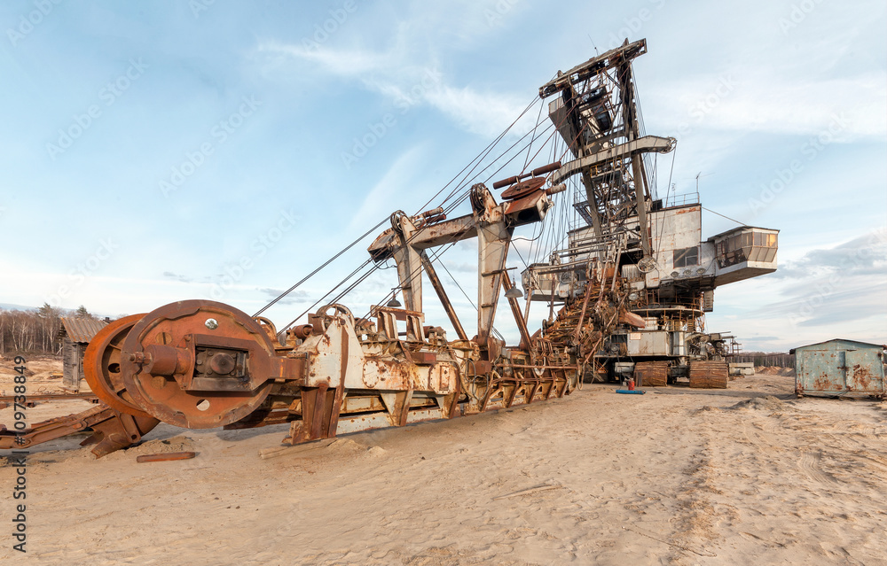 Many buckets of giant career excavator Equipment for the extraction of sand from the quarry.