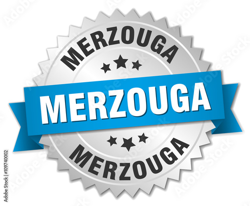 Merzouga round silver badge with blue ribbon