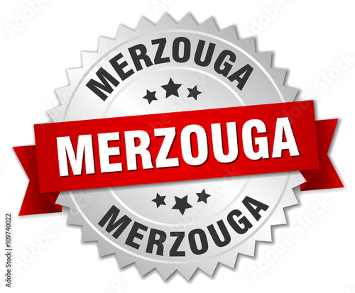 Merzouga round silver badge with red ribbon