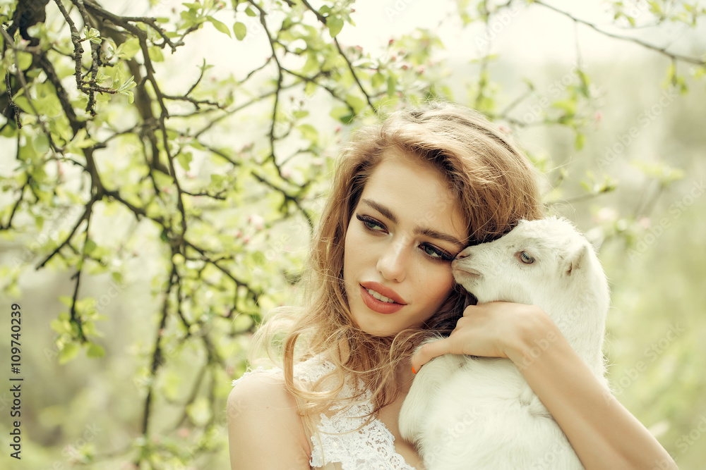 Pretty woman with goat Pretty woman with goat
