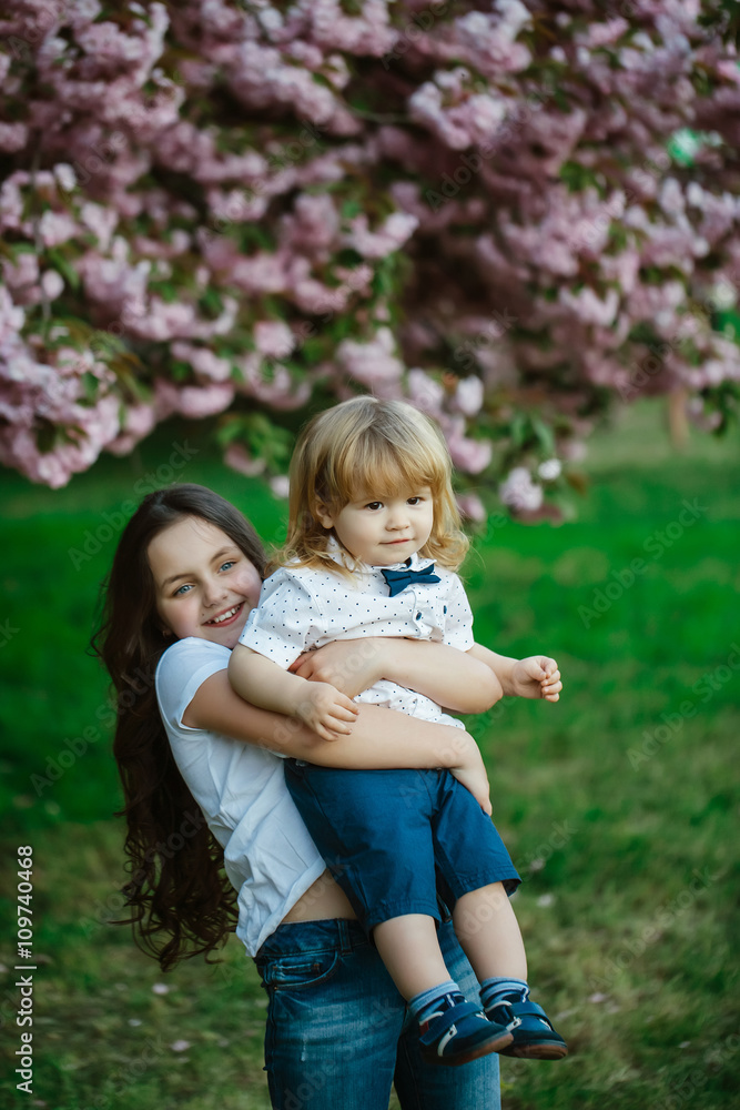 Fototapeta premium Happy children in orchard