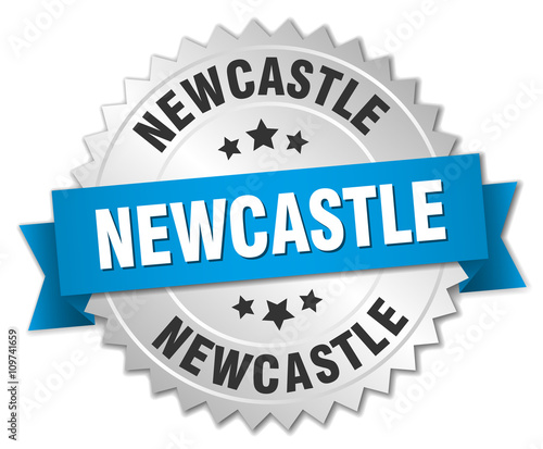 Newcastle round silver badge with blue ribbon
