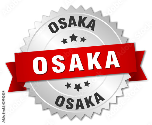 Osaka round silver badge with red ribbon