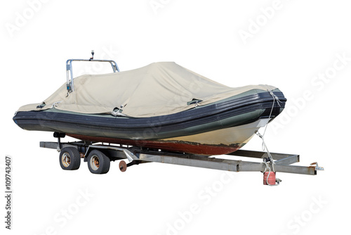 powerboat on a trailer isolated on white background