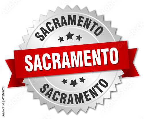 Sacramento  round silver badge with red ribbon