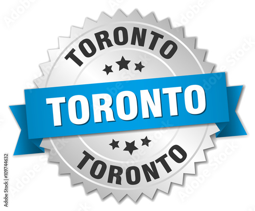 Toronto round silver badge with blue ribbon
