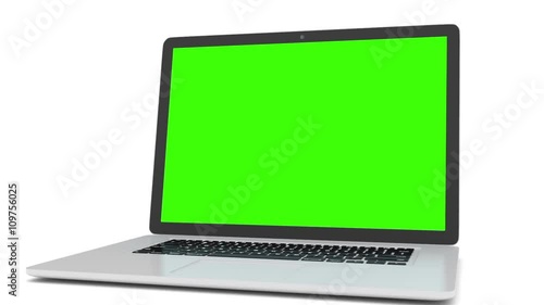 Isolated laptop with green screen on white background. Camera rotating around notebook. Template empty green screen.