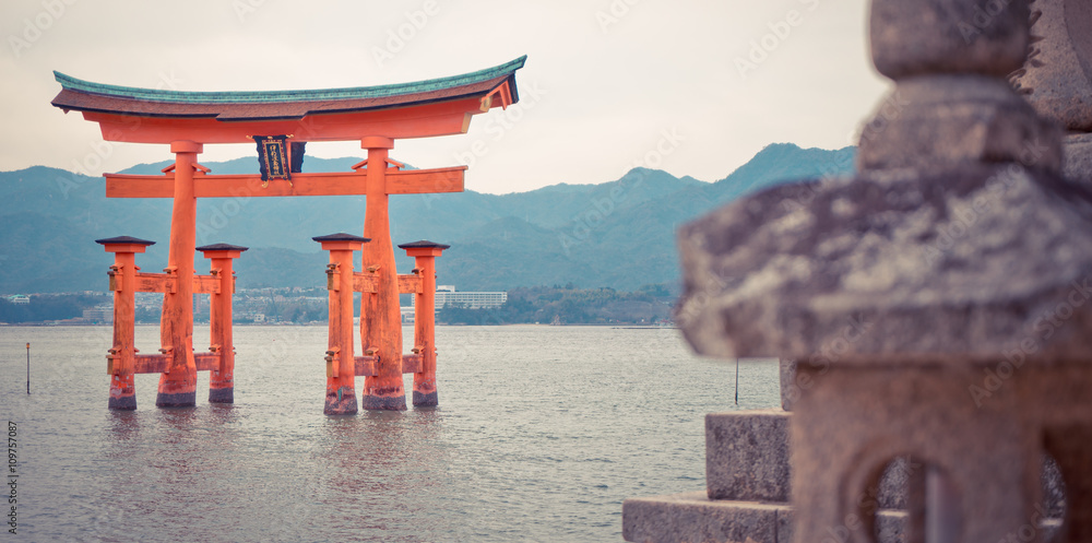 Naklejka premium Miyajima Torii is floating on high tide sea.