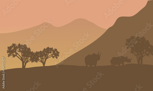 Rhino silhouette on the mountain