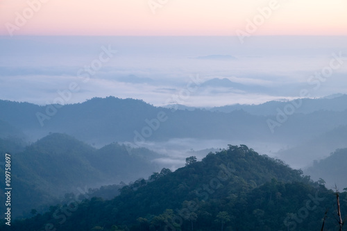 Mountain fog scenic sunrise morning at thongphaphum, kanchanaburi, thailand