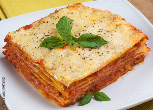 italian lasagna on a plate photo