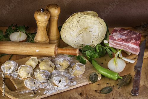 Cookind dumpling with meat and vegetables photo